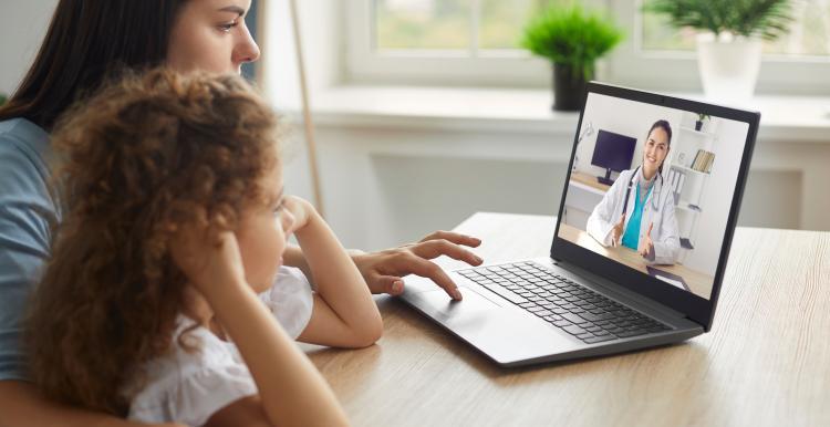 mother_and_child_talking_with_a_doctor_on_the_laptop