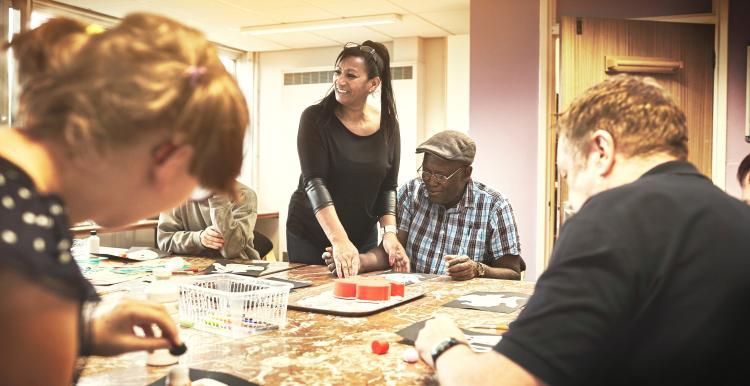 people_sitting_at_a_table_playing_bingo