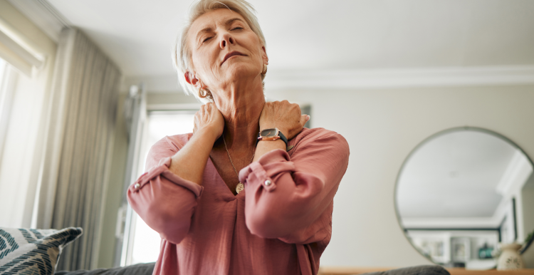 Woman_with_short_white_hair_stretching_her_neck